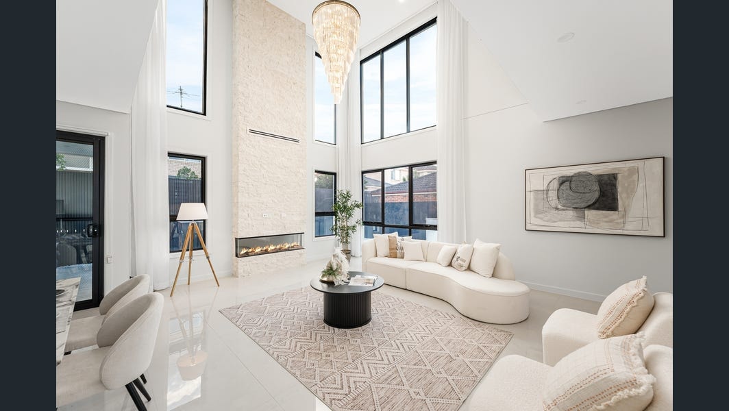 Glenwood grand double-height family room styled by Orchid Home Styling